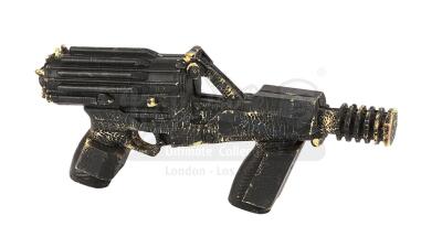 Lot #676 - STAR WARS: THE PHANTOM MENACE (1999) - Naboo Guard Stunt Blaster